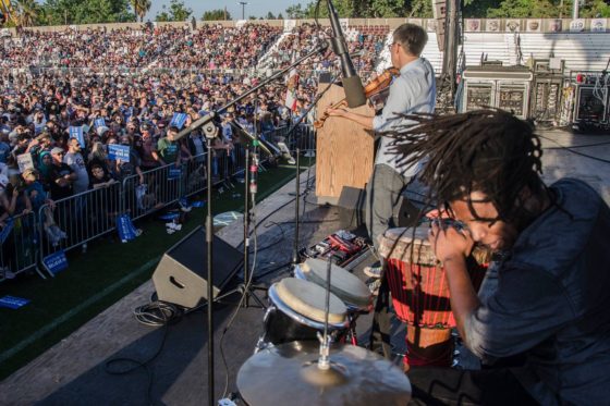 head banging dreadlocks in a stadium